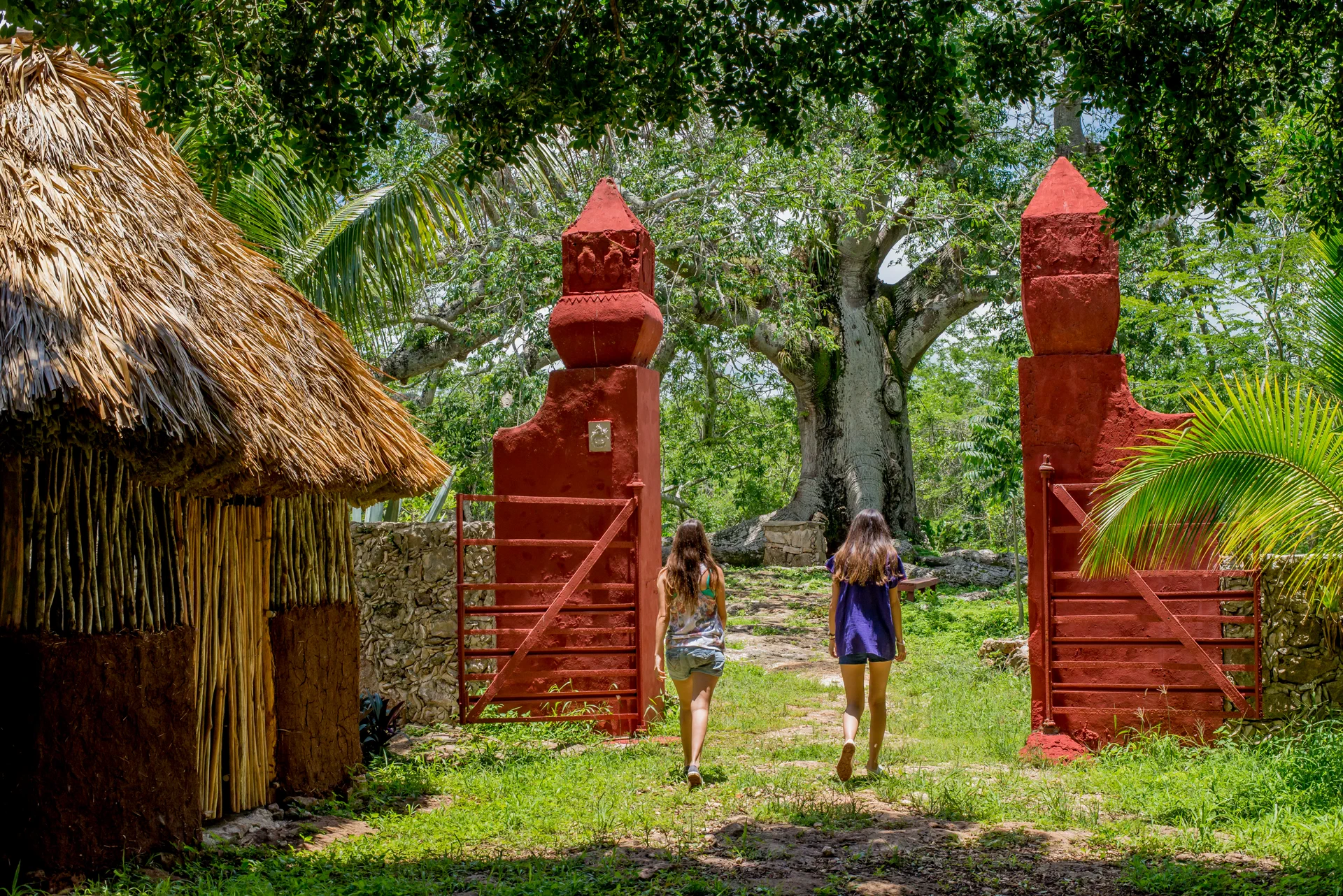 Guests walking through the entrance to Hacienda San Gerónimo